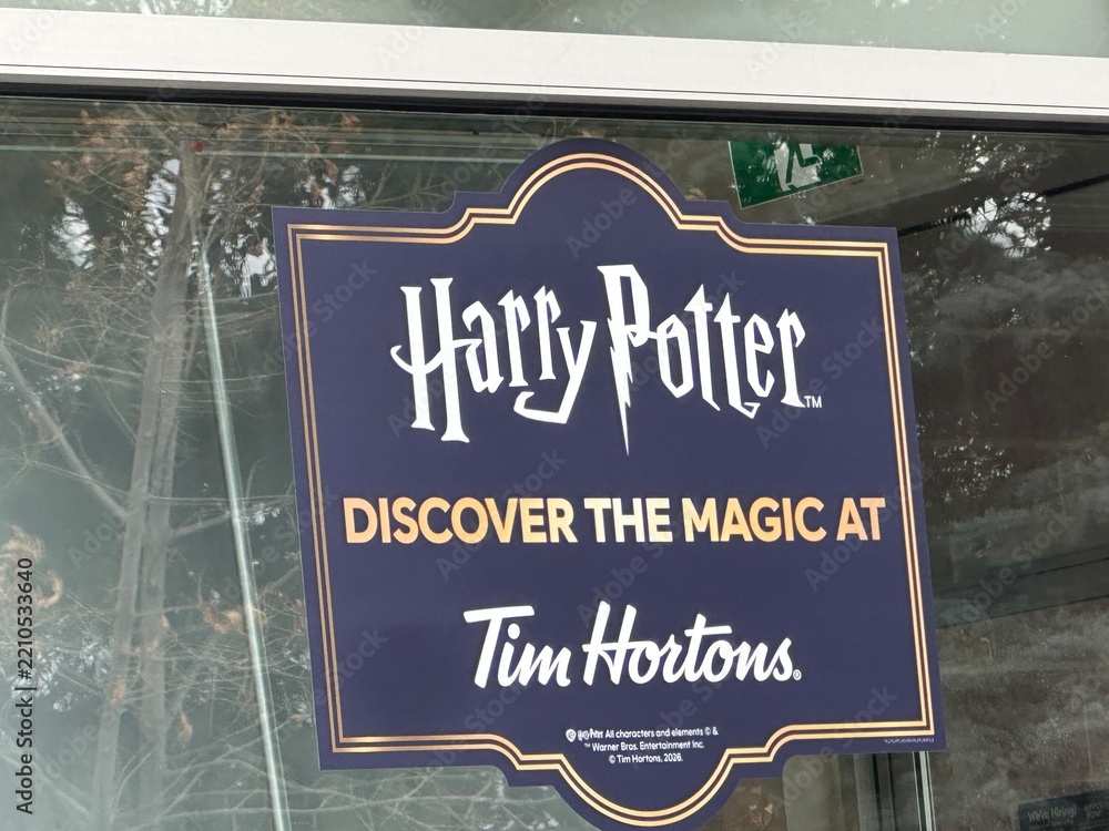 Obraz premium Tim Hortons Exterior Restaurant Featuring Harry Potter Promotional Signage. September 30 2026. Alberta Canada. For editorial use only.