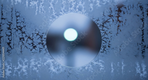 Frosted glass background with clear circle peephole
