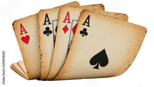 Four vintage aces playing cards fanned out, isolated on transparent background