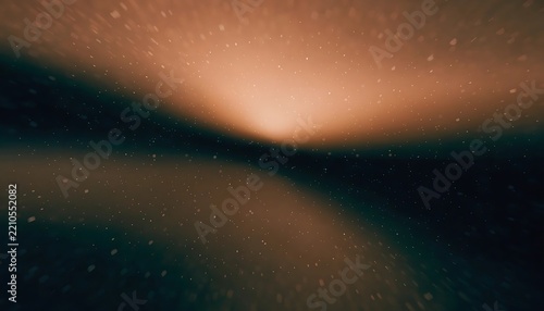 Abstract blurred background with soft light transitions and dark shadows in warm orange and deep blue tones