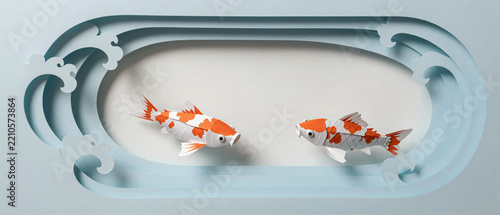 Wide papercut banner origami koi fish swimming in paper waves