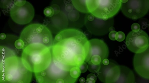 Soft Green Bokeh Circles on a Dark Background