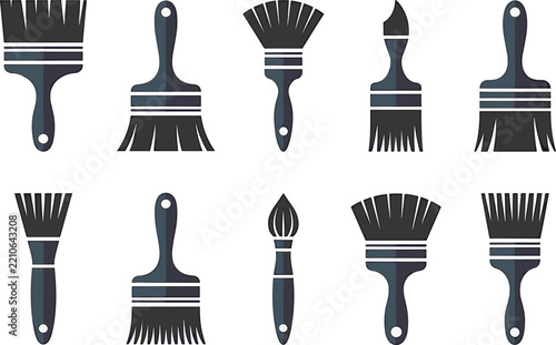 Paintbrushes and rollers set for home improvement or construction project design.