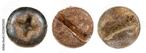 Macro view of heavily oxidized vintage industrial cross-head bolt relic showing deep rust layers