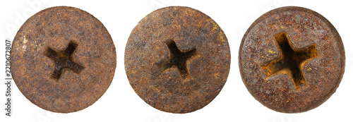 Trio view showcasing the dramatic stages of oxidation on old cross-shaped metal fasteners