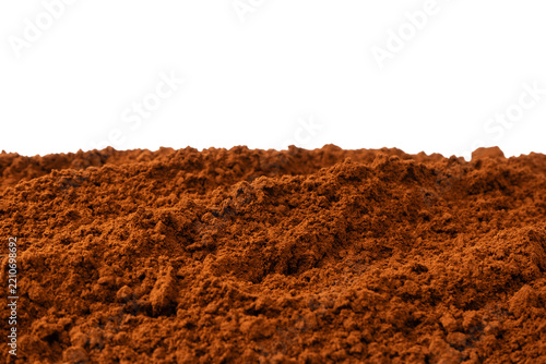 A pile of cocoa powder isolated on a white background.
