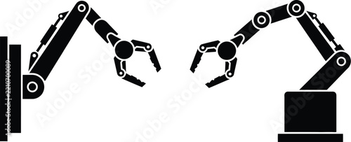 Two robotic arms working in a modern factory and manufacturing production line