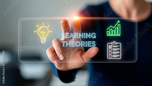 A person interacting with a learning theories interface for the concept of education and knowledge.