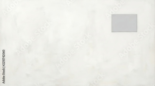 Abstract white textured wall with a small square window and soft lighting