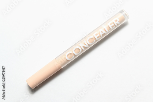 Facial concealer on a white background. Top view.