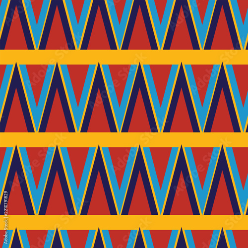 Vibrant geometric pattern featuring red, blue, and yellow triangles, ideal for contemporary design.