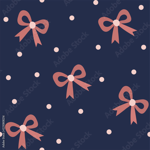 Seamless Christmas pattern featuring elegant pink bows and small decorative dots on a dark navy background. Festive and stylish design for wrapping paper, textiles, fabric, apparel and holiday packagi