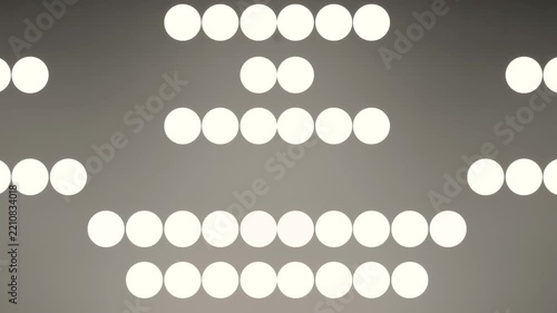 Loosely Scattered Cream Orbs Drifting Over a Charcoal Surface