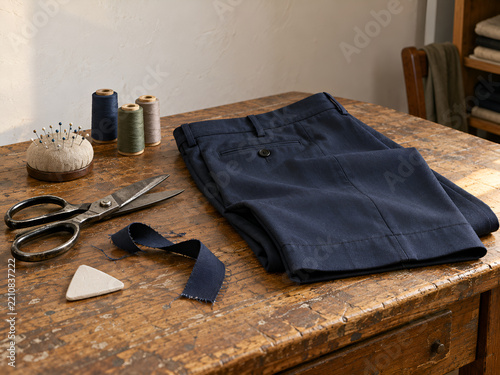 Tailoring worktable prepared for garment alterations
