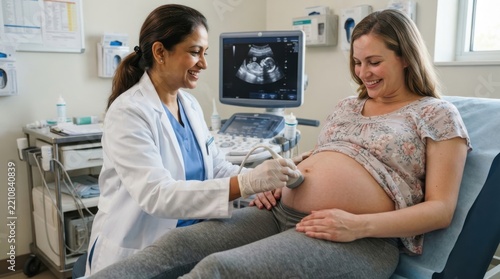 Pregnant woman receiving an ultrasound scan from a doctor in a clinic