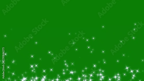 Shining star particles rising on green screen background, glowing glitter sparkle overlay loop motion graphics for christmas celebration background, wedding video and fantasy magic vfx. 4k