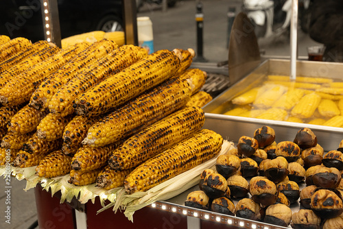 Traditional Turkish street food with grilled corn and roasted chestnuts