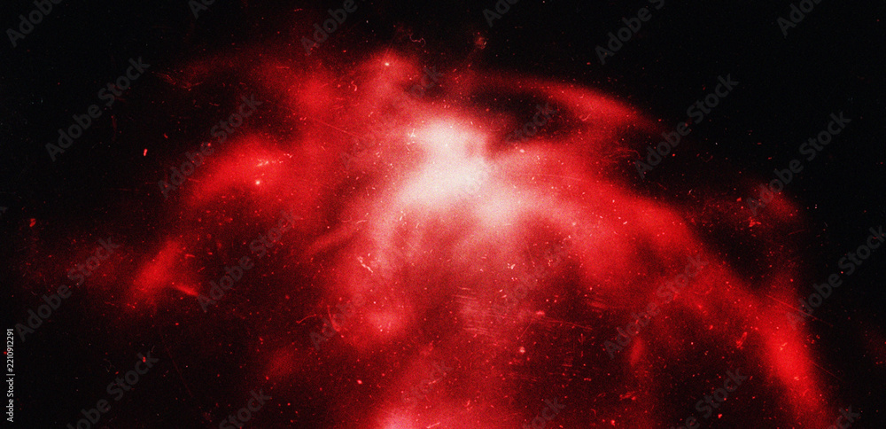 Fototapeta premium Abstract red nebula cloud glowing in deep space with grainy texture