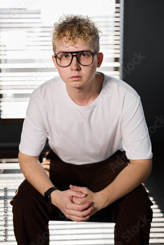 Portrait with emotional depth. Young man captured with intense expression