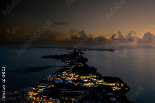 Lit Corridor — Night Aerial of Bermuda's Coast