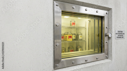 High radiation area with lead glass window viewing radioactive isotopes stored in a secure vault