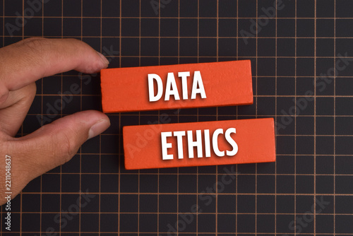 A conceptual image featuring data and ethics blocks, representing privacy, security, responsible information use, compliance, technology, and ethical data management.