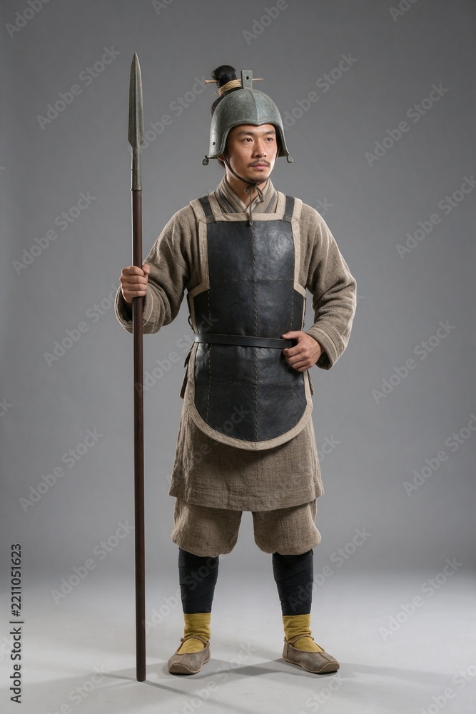 Obraz premium Chinese Zhou Dynasty Elite Guard in a Bronze Helmet with a Spear