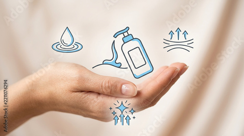 Dermatology and skin care concept with human hand and icons for hydration moisturizing lotion pump bottle skin elasticity and radiant glow effects