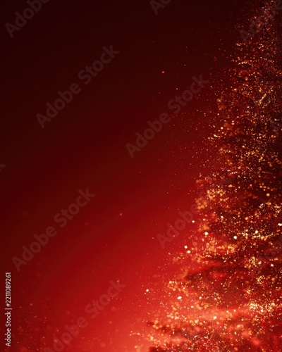 Red christmas background with glowing gold particles
