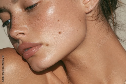 Woman's beautiful face and neck featuring healthy, natural skin and minimal makeup