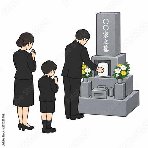 Japanese family placing urn in the grave at an interment ceremony