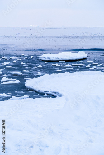 Ice floes and frozen sea in a tranquil winter landscape