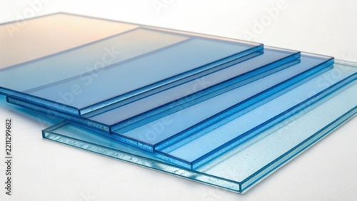 Stack of translucent blue resin panels with clean, geometric edges