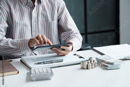 Close Up Business man Hands Using Calculator for Expense Tracking Personal Budgeting Financial Planning and Money Management
