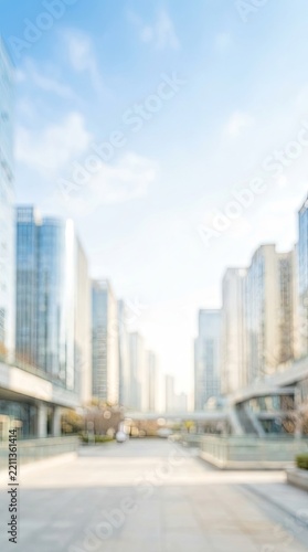 Blurred urban corporate buildings with sunlight and copy space for commercial design