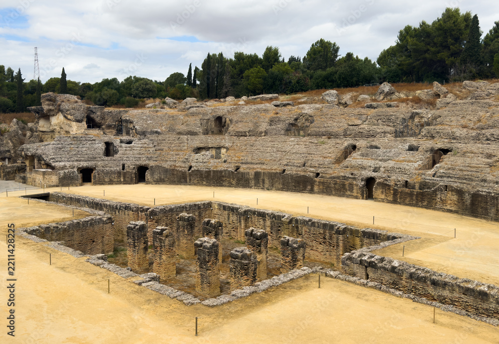 Fototapeta premium The arena in the amphitheater of Italica, an archaeological site at the outskirts of Seville