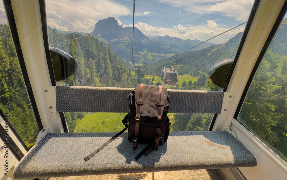 Obraz premium backpack on a cable car in the Dolomites