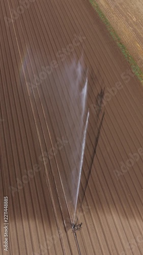 Aerial View Agricultural Irrigation Reel Watering Vegetable Field in Italy