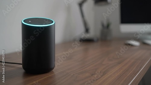 Smart Home Voice Assistant Speaker on Wooden Desk Interior Background for Video Content