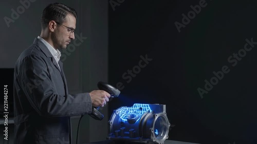 Engineer Using 3D Scanner to Inspect Mechanical Part in Video