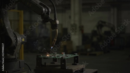 Industrial Robotic Arm Precision Welding Electronic Circuit Board in Factory Video