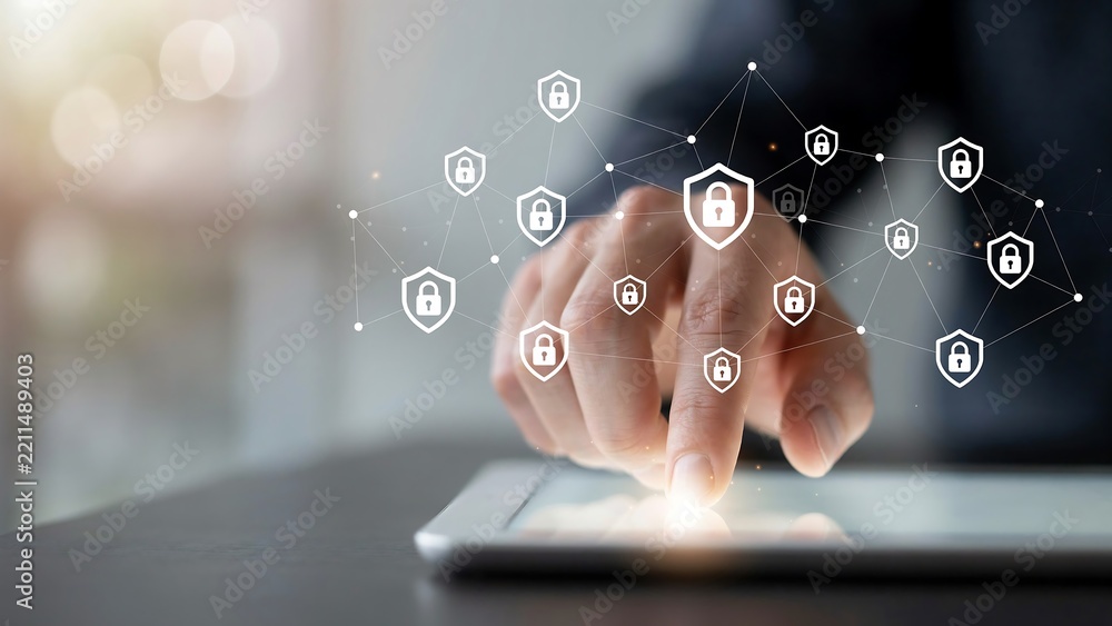 © Mst Rozina Pervin - Hand touching tablet screen with glowing digital security network icons in soft light © Mst Rozina Pervin - Hand touching tablet screen with glowing digital security network icons in soft light