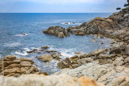Dramatic Geological Fault Line and Unique Rock Formations along Haeparang-gil Coastal Trail in Yeongdeok, South Korea (Scenic Coastal View of Exposed Rock Strata and Deep Blue Sea)