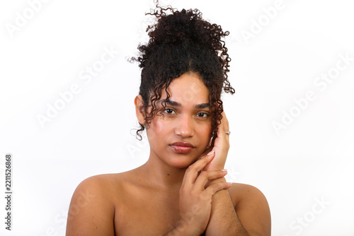 Skin care and beauty routine with a young woman in a studio setting