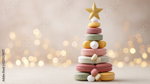 Festive macaron tree with golden star on soft bokeh background