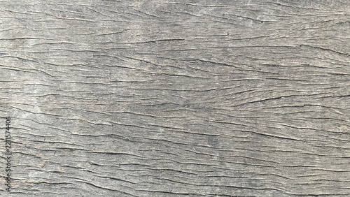 Rustic weathered wood plank texture with prominent wavy grain