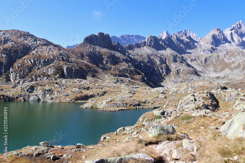 Small alpine lake surrounded by the Brenta Dolomites in Trentino, Italy