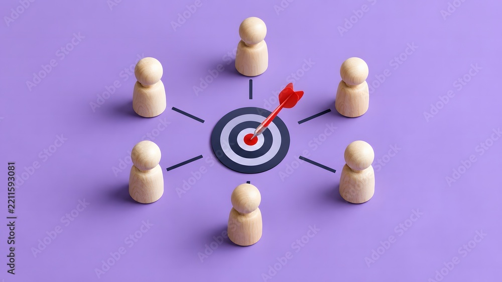 Fototapeta premium A conceptual studio shot of wooden figures arranged in a network around a central dartboard target, symbolizing professional goal alignment and strategic teamwork.