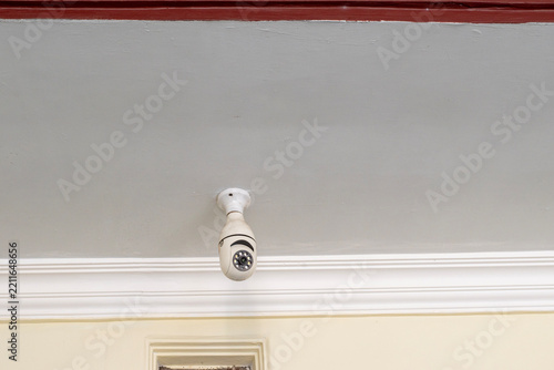 Ceiling-mounted smart bulb-style CCTV camera for home security monitoring. Wireless IP security camera with a light bulb design.