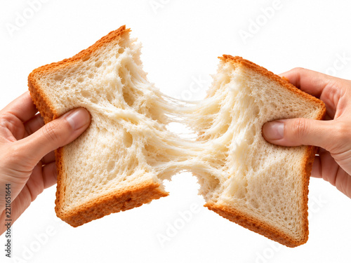 Hands Tearing Fresh Slice of White Bread Isolated on White Background.